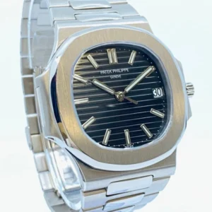 Patek Philippe Nautilus For Sale in With Gold extremely rare unworn full set