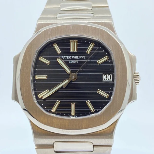 Patek Philippe Nautilus For Sale in With Gold extremely rare unworn full set (3)