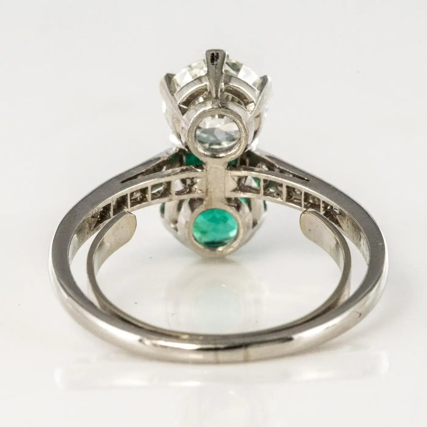 1930s-French-Platinum-Art-Deco-Emerald-Diamond-You-and-Me-Ring-11.webp