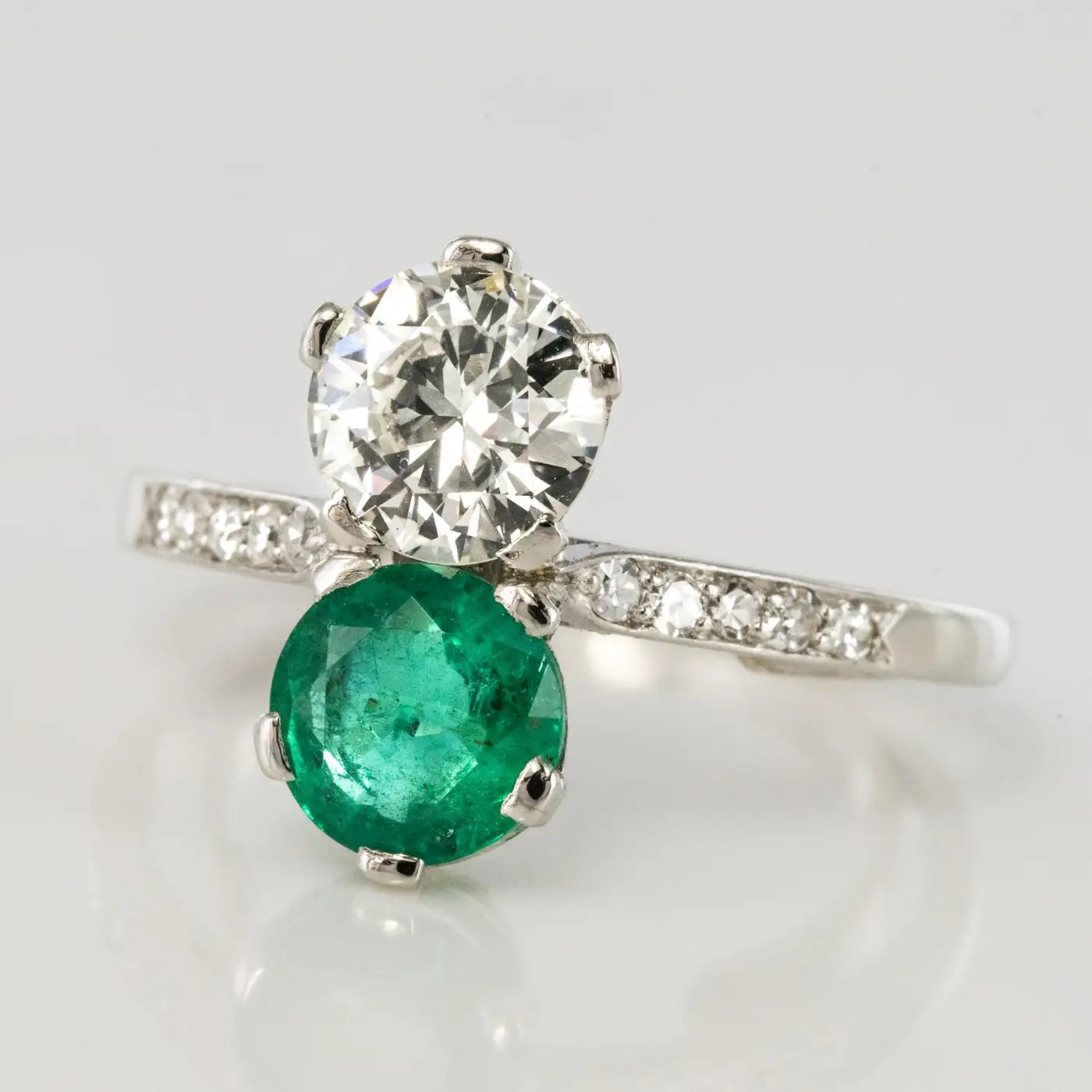 1930s-French-Platinum-Art-Deco-Emerald-Diamond-You-and-Me-Ring-2.webp