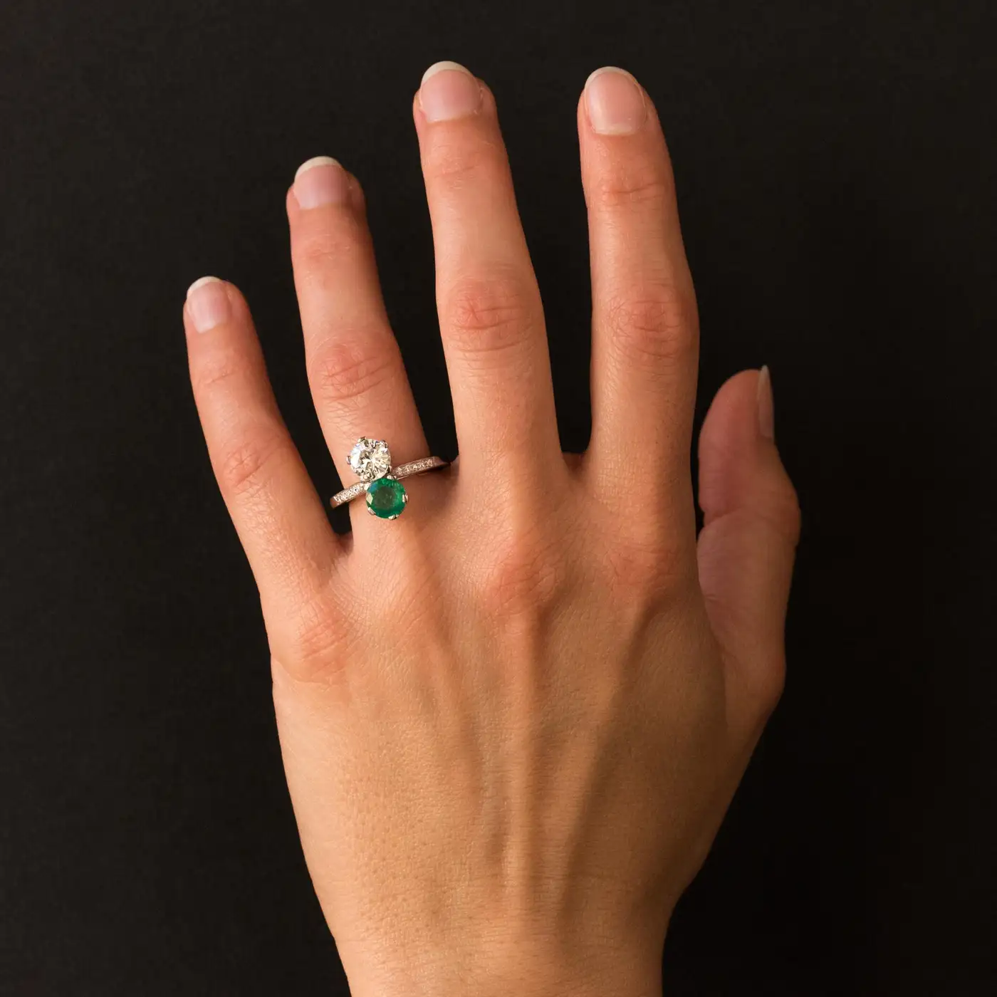 1930s-French-Platinum-Art-Deco-Emerald-Diamond-You-and-Me-Ring-6.webp