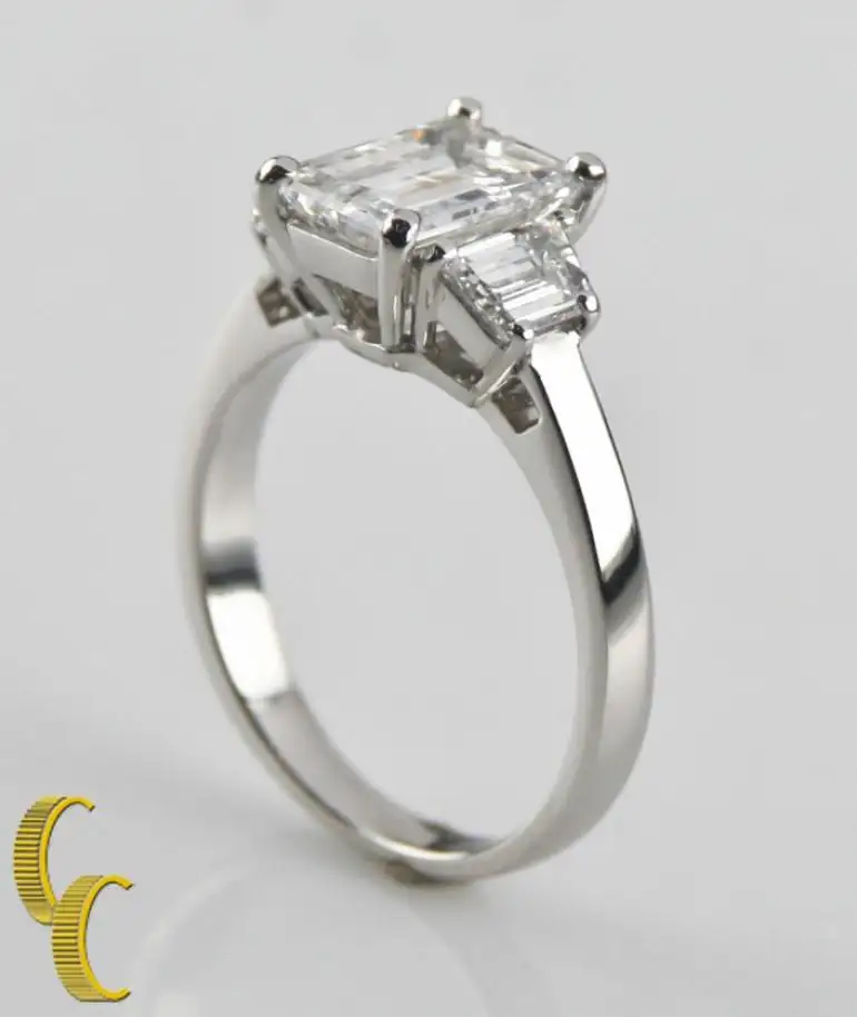 2.10-Carat-Emerald-Cut-Diamond-3-Stone-Platinum-Ring-with-GIA-Certified-4.webp