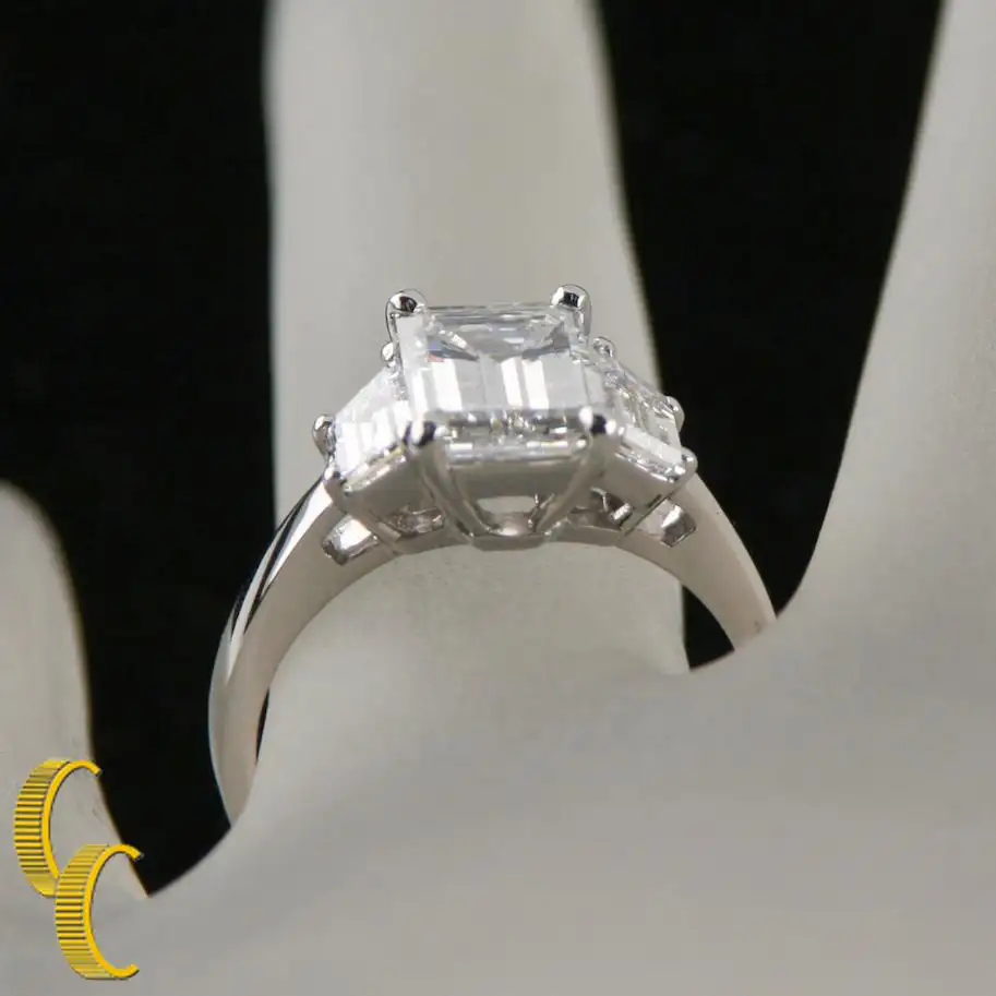 2.10-Carat-Emerald-Cut-Diamond-3-Stone-Platinum-Ring-with-GIA-Certified-5.webp
