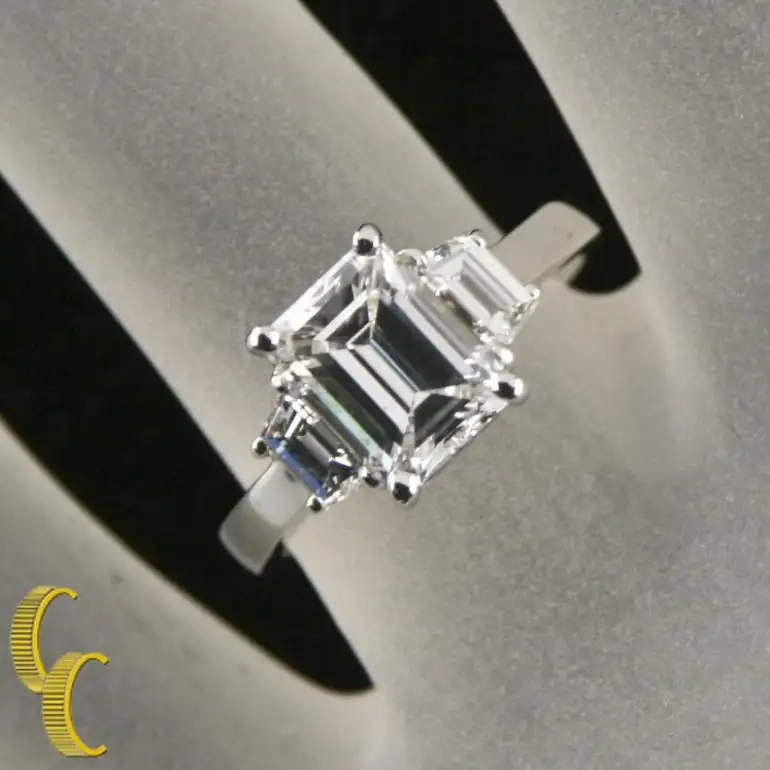 2.10-Carat-Emerald-Cut-Diamond-3-Stone-Platinum-Ring-with-GIA-Certified-6.webp