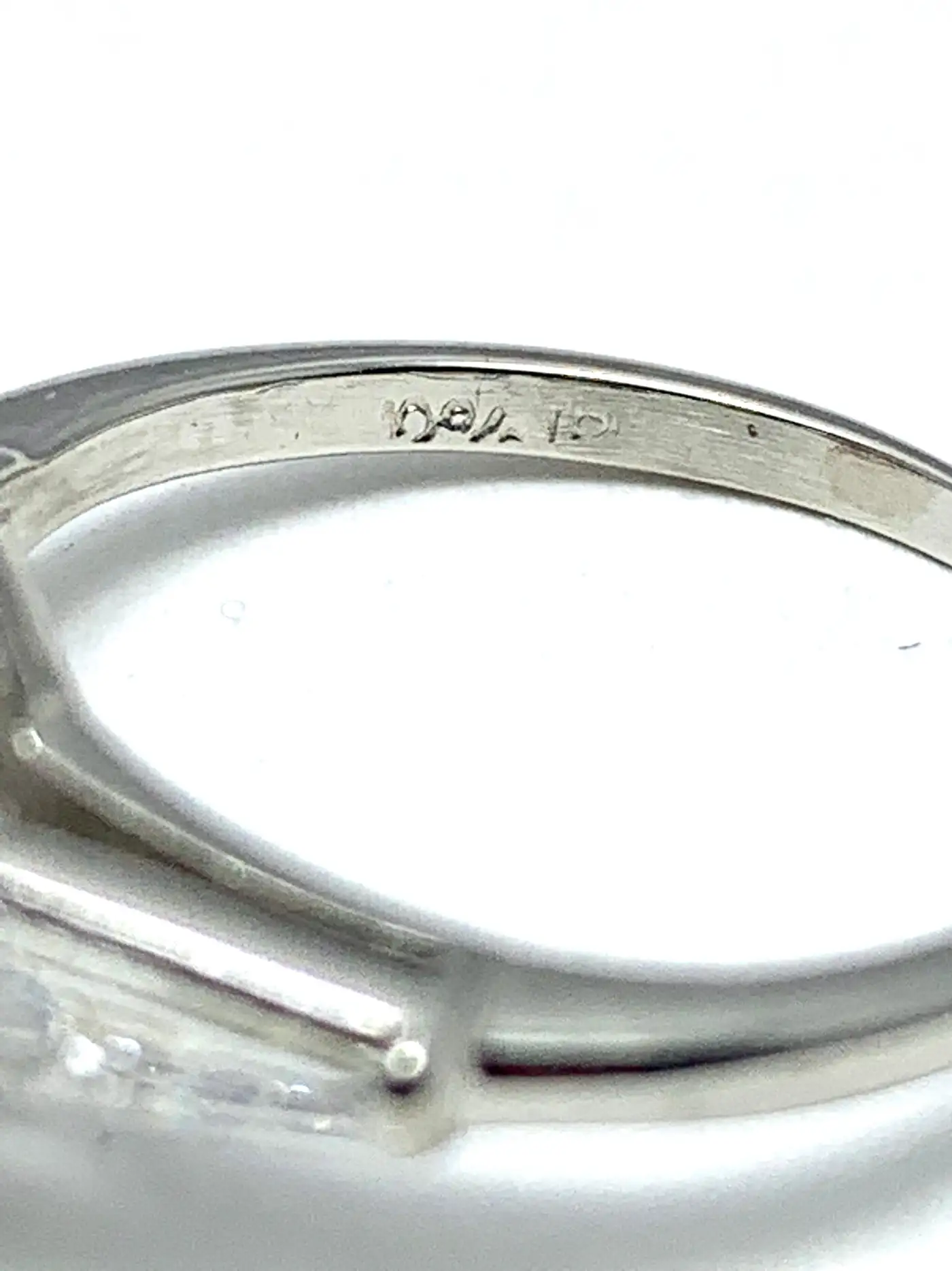 3.14-Carat-D-SI1-Pear-Shape-Diamond-and-Baguette-Diamond-Platinum-Ring-3.webp