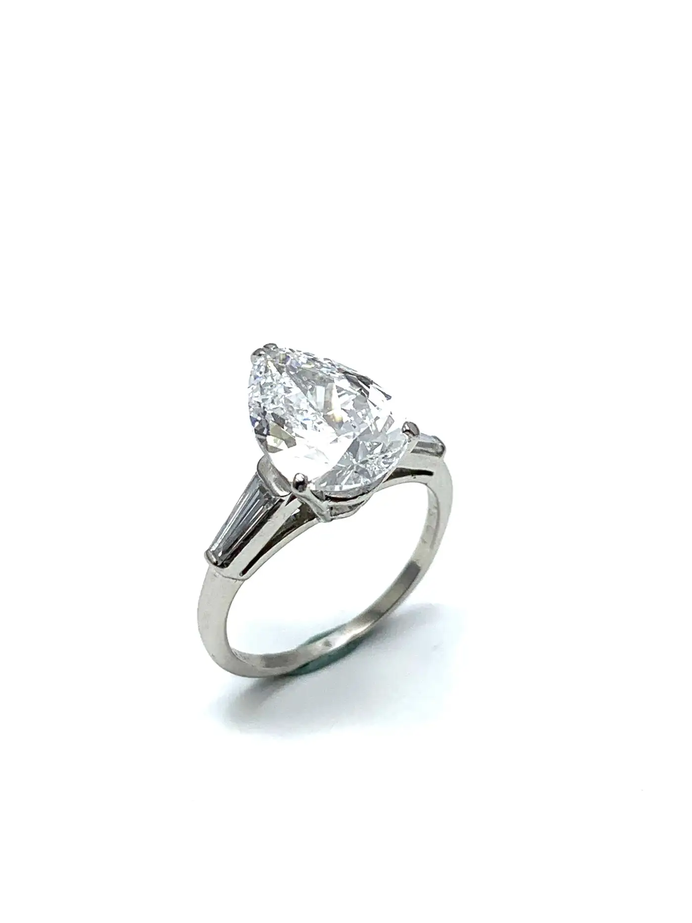 3.14-Carat-D-SI1-Pear-Shape-Diamond-and-Baguette-Diamond-Platinum-Ring-6.webp