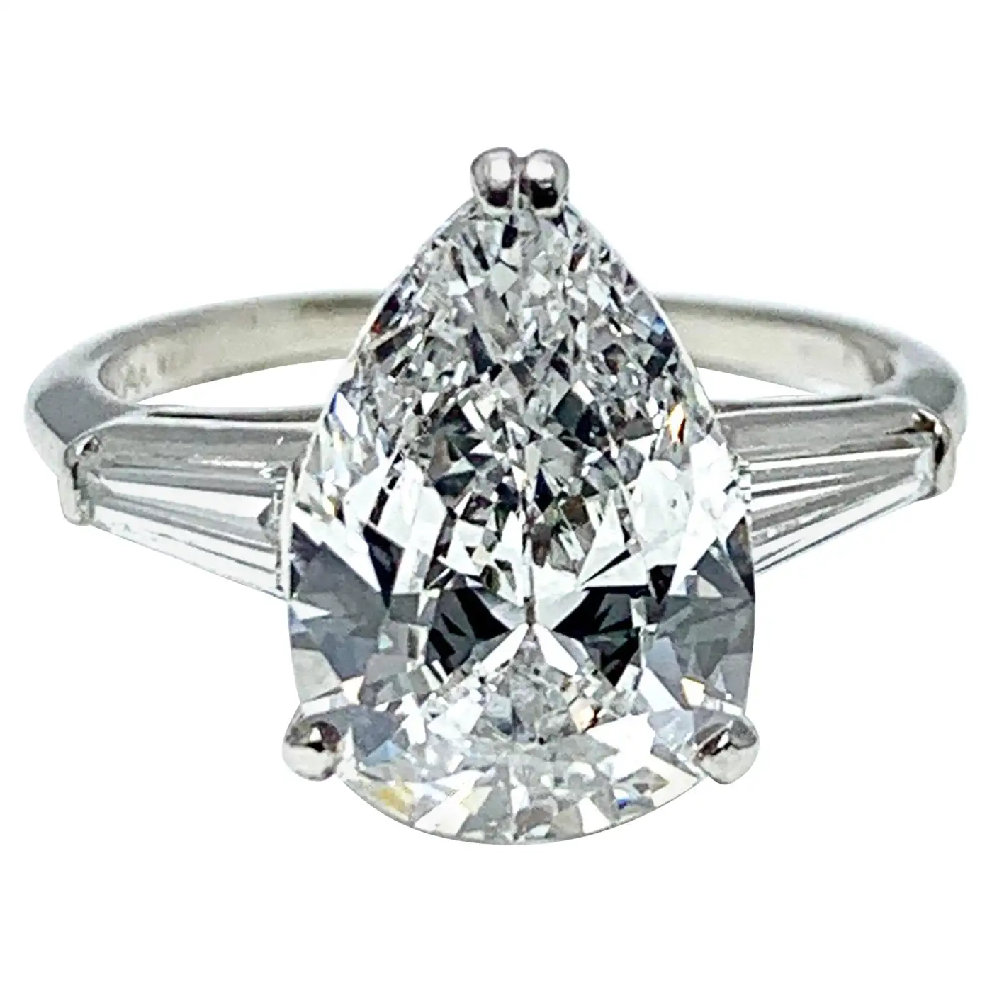 3.14-Carat-D-SI1-Pear-Shape-Diamond-and-Baguette-Diamond-Platinum-Ring-7.webp