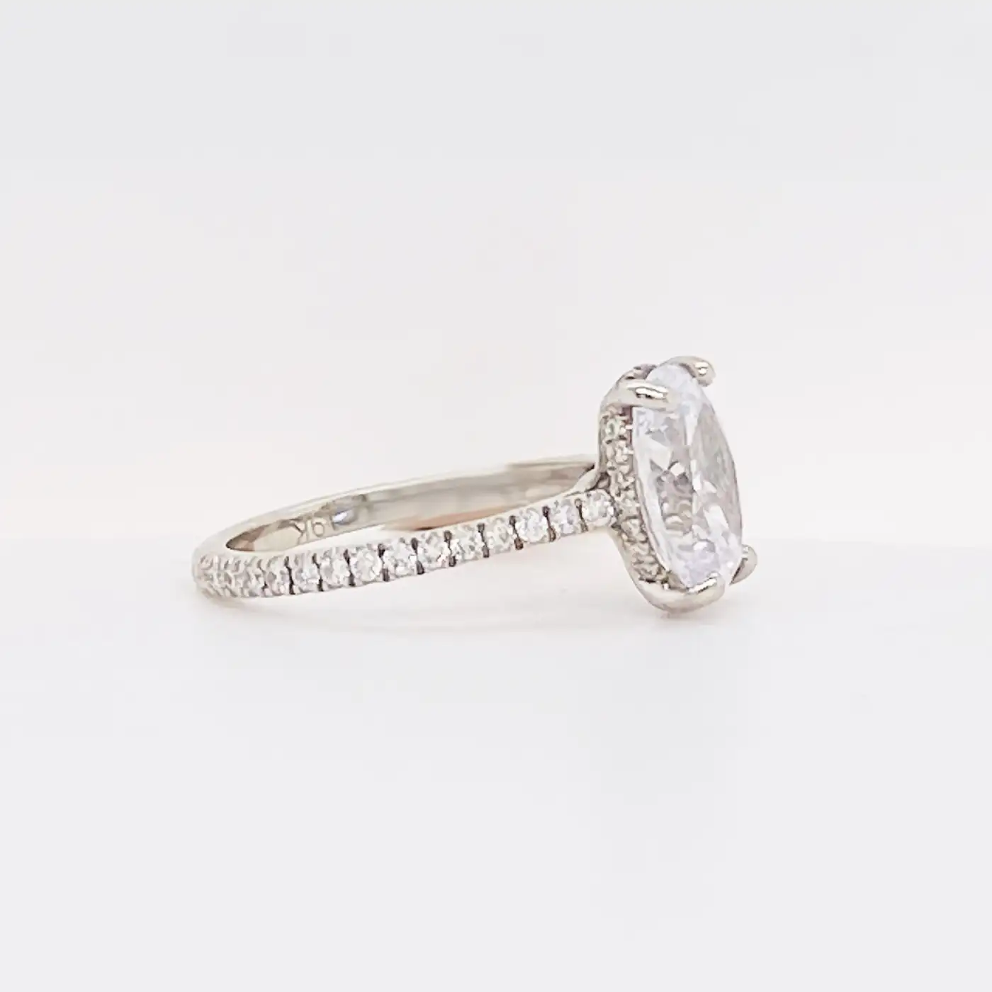 3.50-Carat-Oval-Diamond-Engagement-Ring-Diamonds-on-Band-19-Karat-Gold-2.webp
