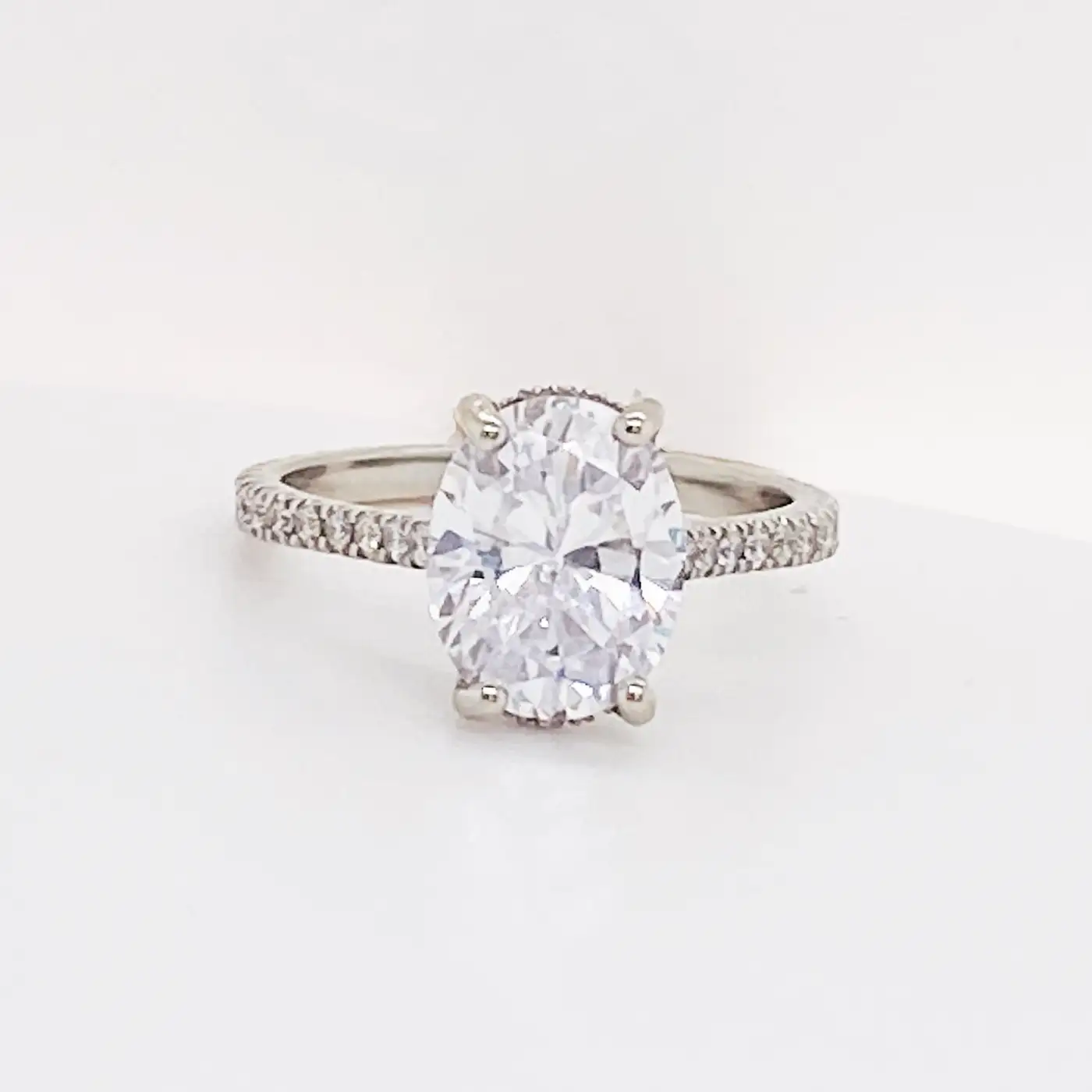 3.50-Carat-Oval-Diamond-Engagement-Ring-Diamonds-on-Band-19-Karat-Gold-3.webp