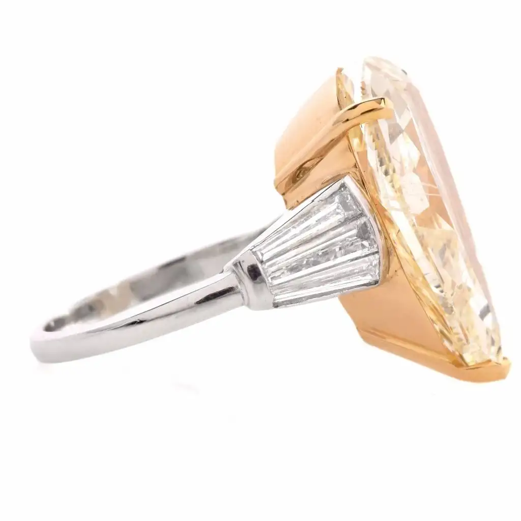 GIA-13.41-Carat-Natural-Fancy-Pear-Diamond-with-Baguette-Platinum-and-Gold-Ring-4.webp