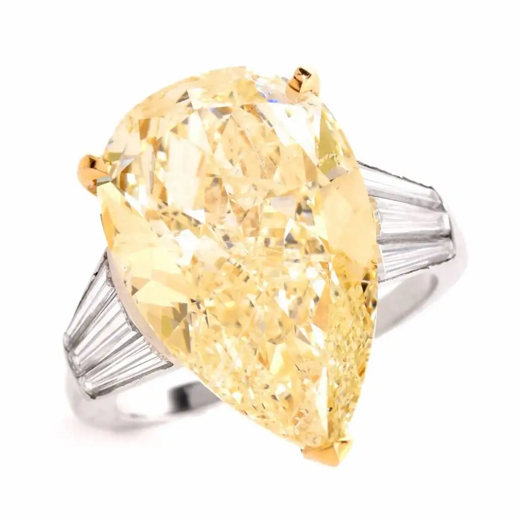 GIA-13.41-Carat-Natural-Fancy-Pear-Diamond-with-Baguette-Platinum-and-Gold-Ring-6.webp