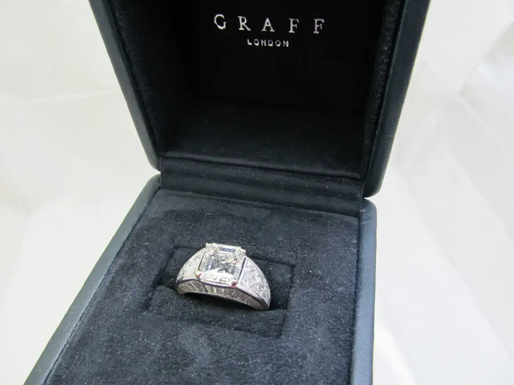 Graff-GIA-Certified-Emerald-Cut-4.03-Carat-Diamond-Fancy-Cut-Diamond-Set-Ring-3.webp