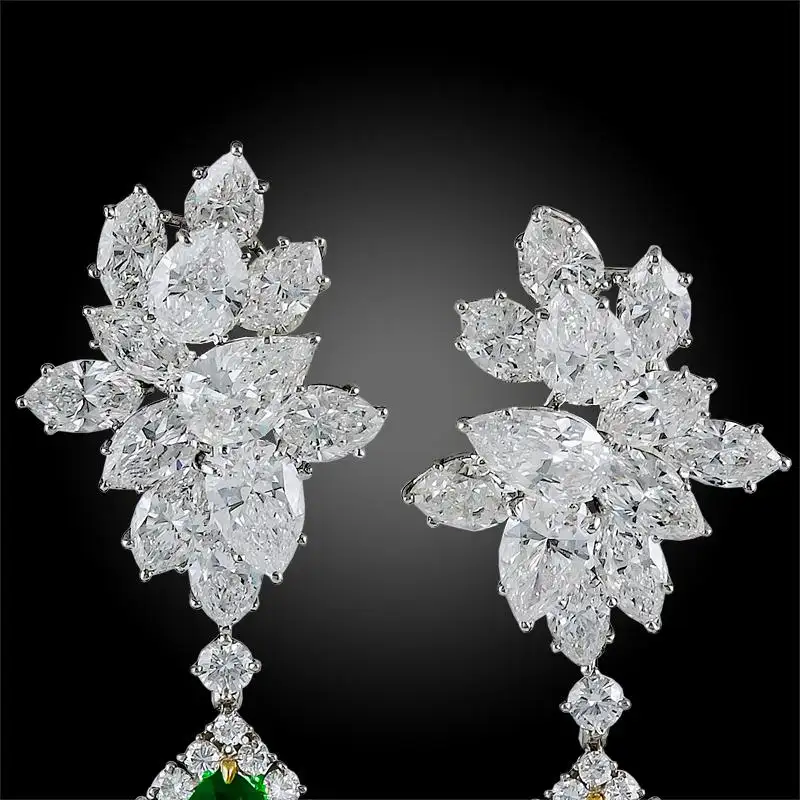 Harry-Winston-Emerald-Diamond-Cluster-Platinum-Pendant-Earrings-2.webp