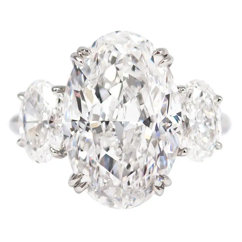 J.-Birnbach-GIA-Certified-8.03-E-SI1-Carat-Oval-Diamond-Three-Stone-Ring-1.webp