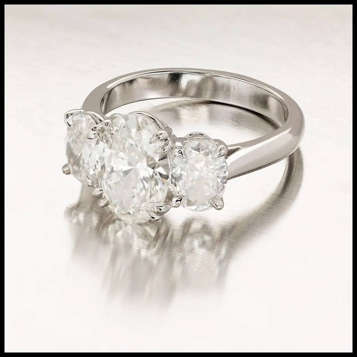Peter-Suchy-2.01-Carat-Oval-Diamond-Platinum-Three-Stone-Engagement-Ring-4.webp