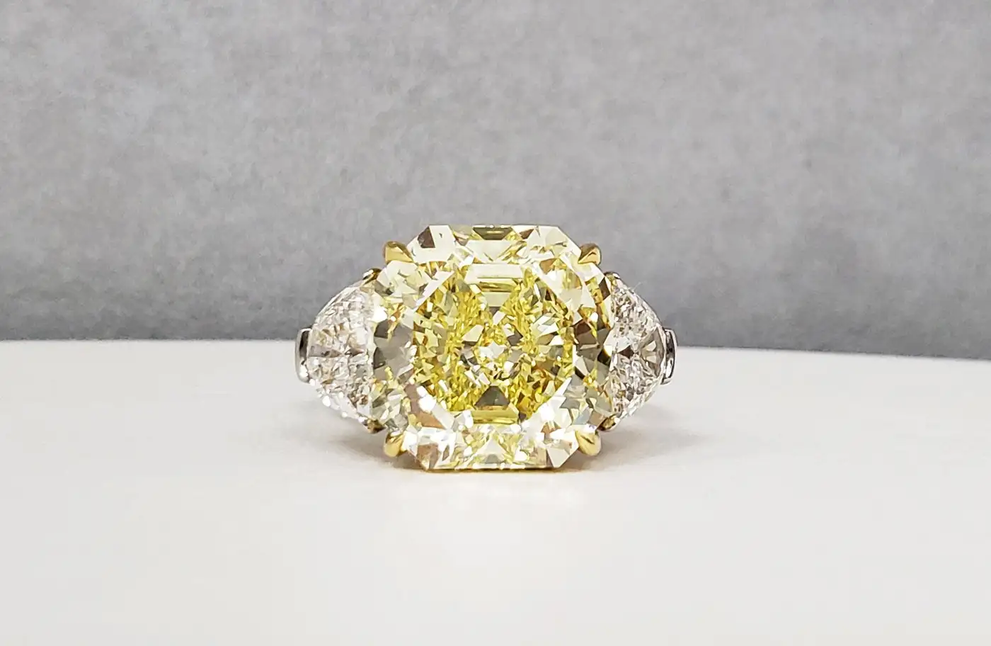 Scarselli-10-Carat-Fancy-Intense-Yellow-Internally-Flawless-Radiant-Diamond-Ring-1.webp