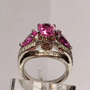 Spectacular Vivid Pink Sapphire Diamond Platinum Three-Stone Ring