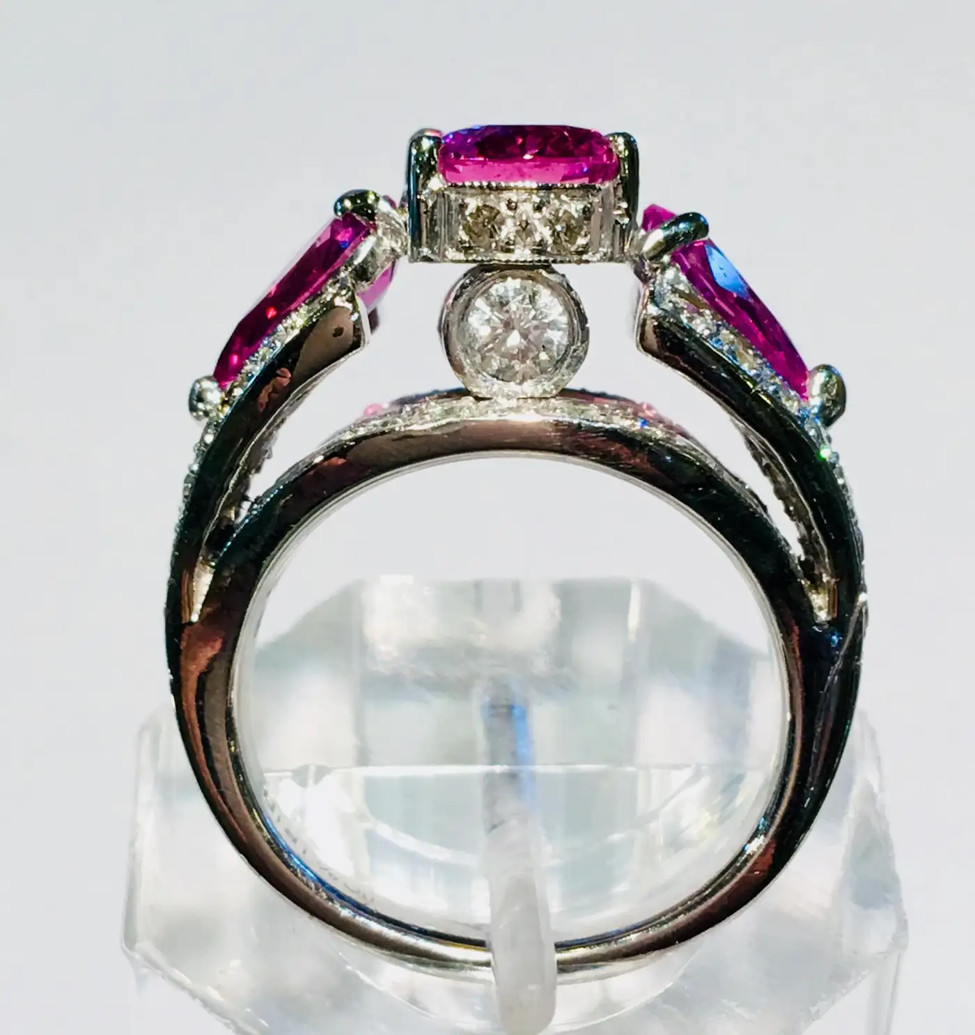 Spectacular-Vivid-Pink-Sapphire-Diamond-Platinum-Three-Stone-Ring-8.webp