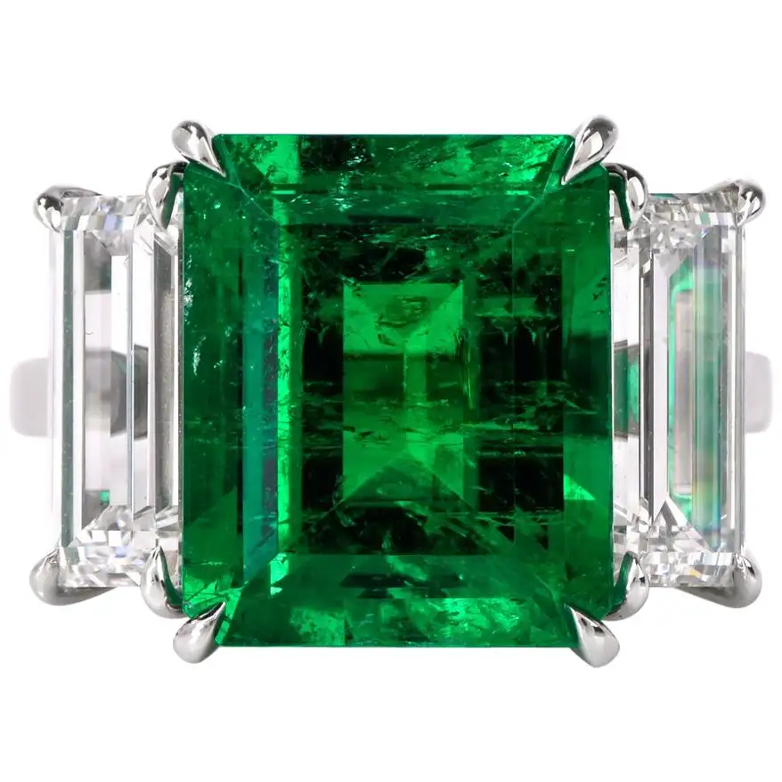 Three-Stone-Rectangular-Emerald-Diamond-Platinum-Ring-1.webp